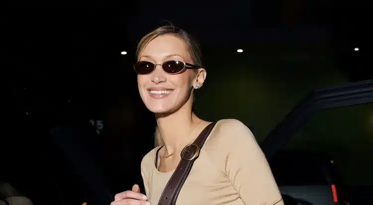 Bella Hadid black bra strap outfit Paris Fashion Week 2025 fashion controversy Balenciaga trousers bold look