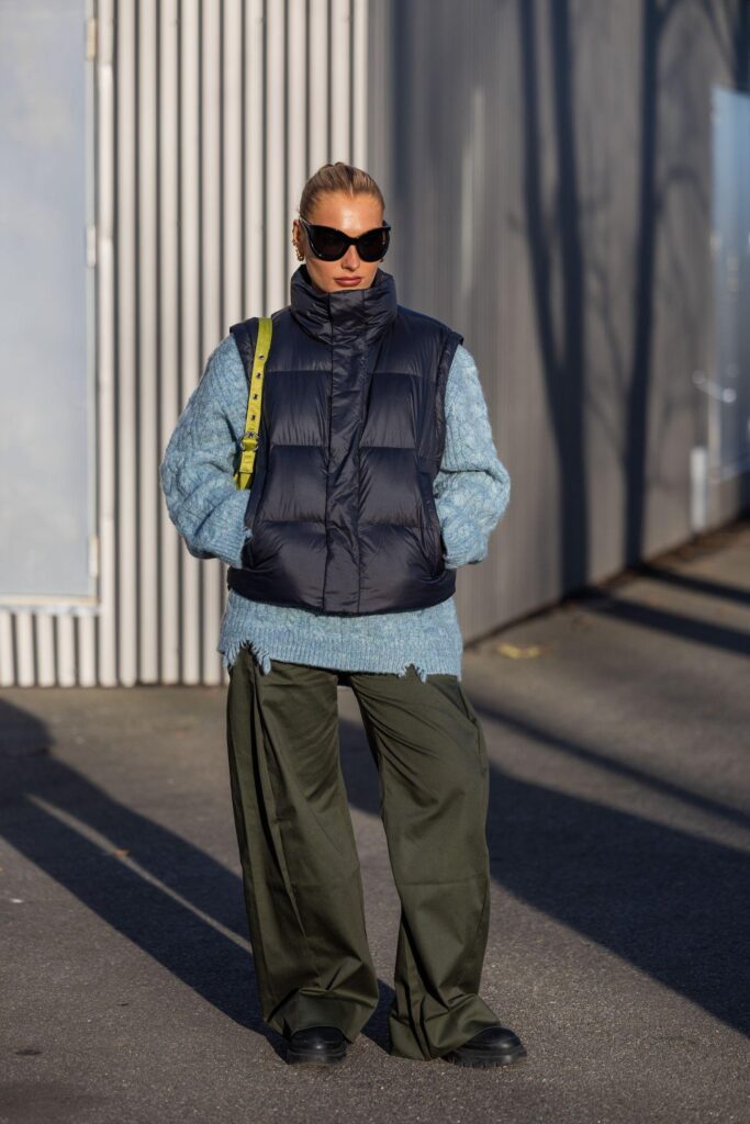 3. Use Lightweight Vests Between Sweaters and Coats