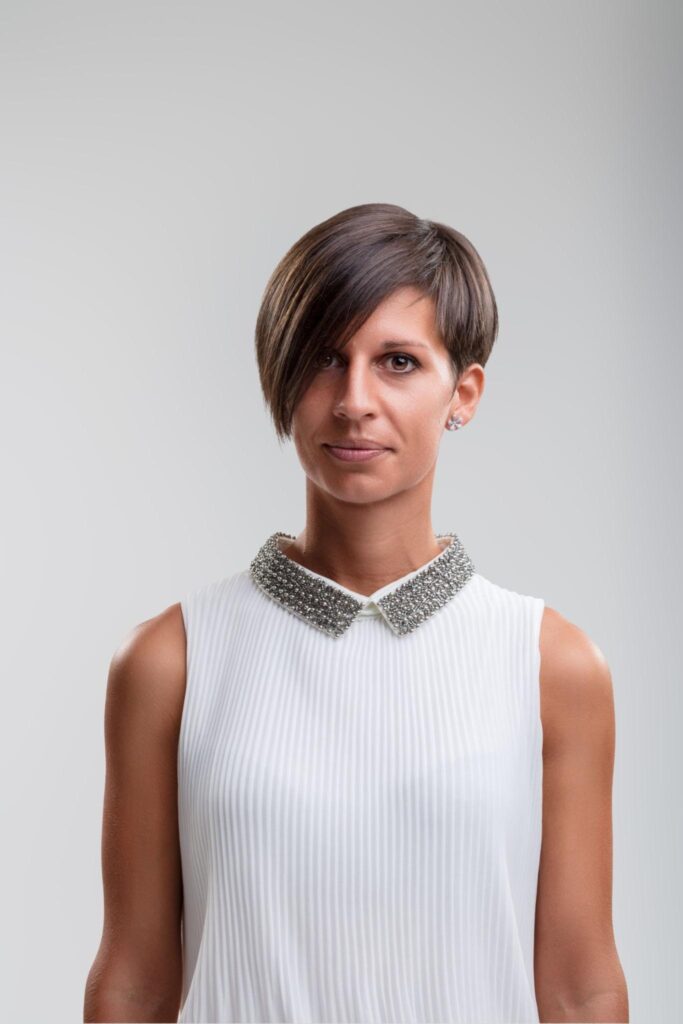 4. Asymmetrical Necklines and Balanced Hairstyles